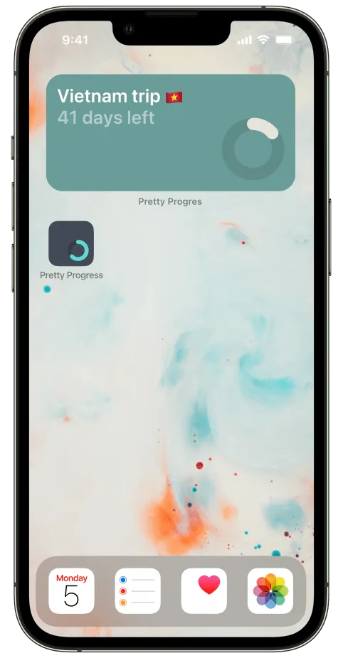 iPhone showing a countdown widget added on its Home Screen with an example showing Vietnam trip